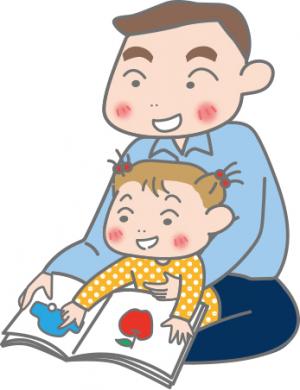 子供と一緒に本を読む父親